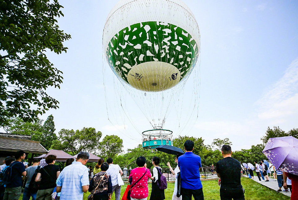 划悠哉悠哉的小船,杭州西溪氦气球让你尽揽湿地风光!